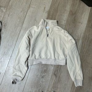 Aritzia TNA cropped quarter Zip in tan/cream sz S